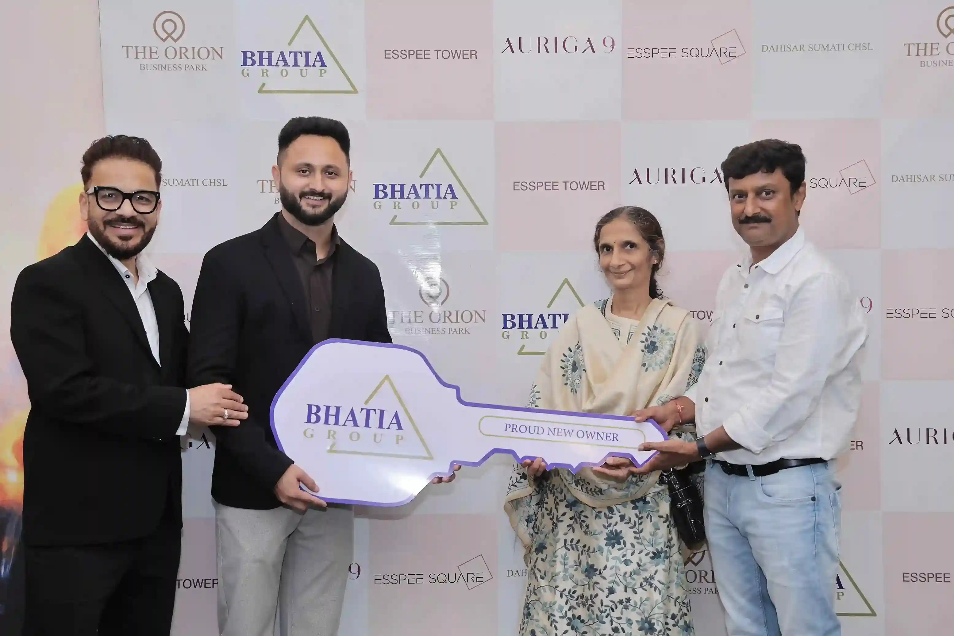 Client Receiving House Keys During Property Handover by Bhatia Builders